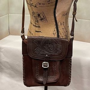 Brown embossed leather hand bag